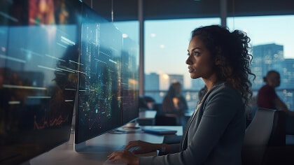 A person looking at a computer screen