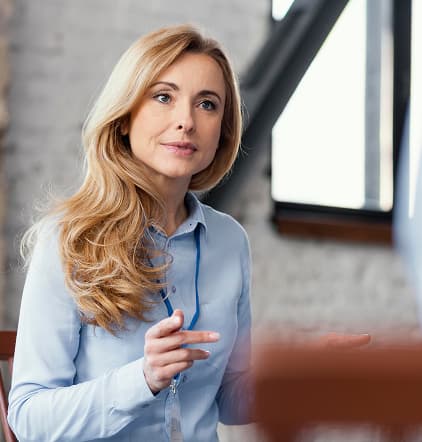 A lady in a blue shirt