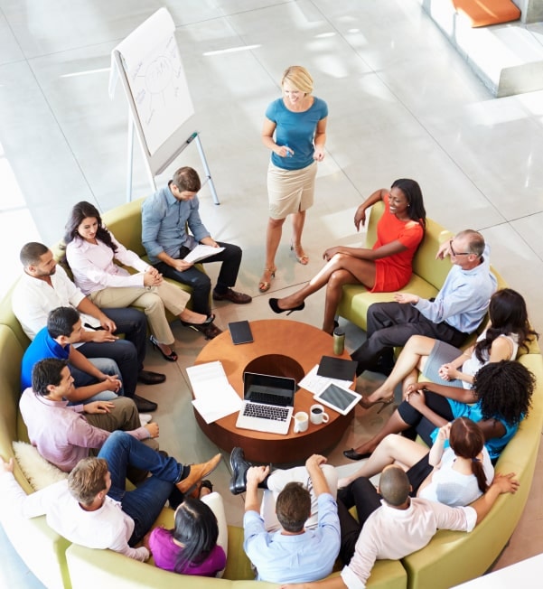A group of people sitting in a circle